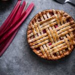 Rhubarb apple pie with an interwoven lattice crust.