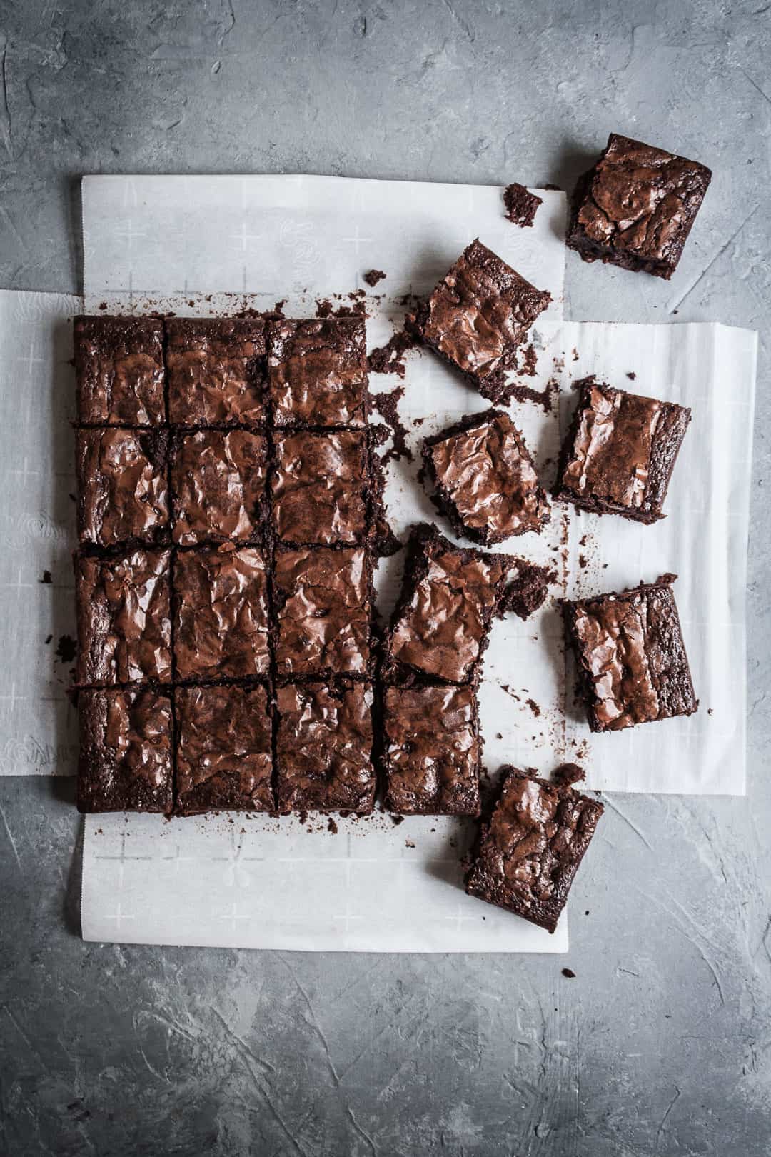 Top view of cut squares of brownies with port soaked cherries