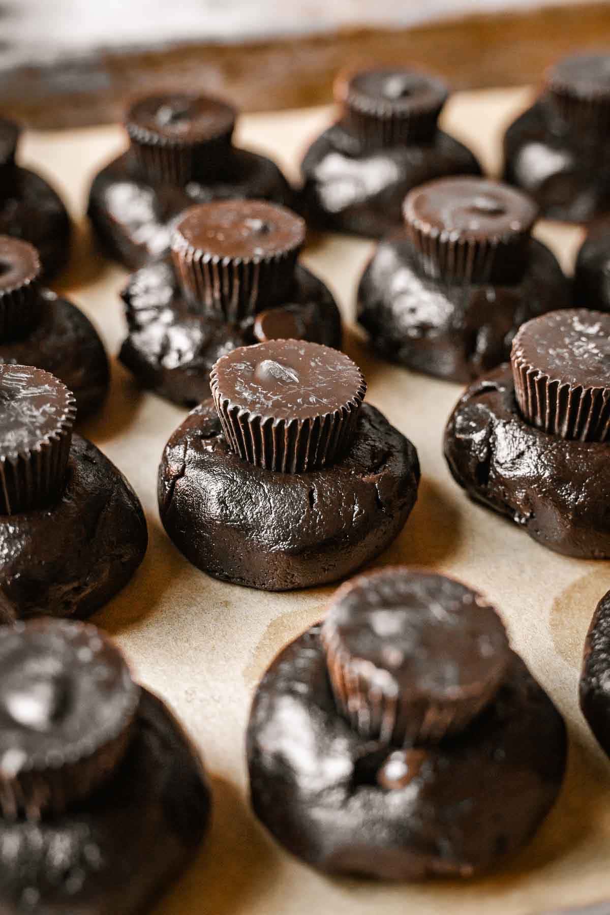 Side view of cookie dough with peanut butter cups.