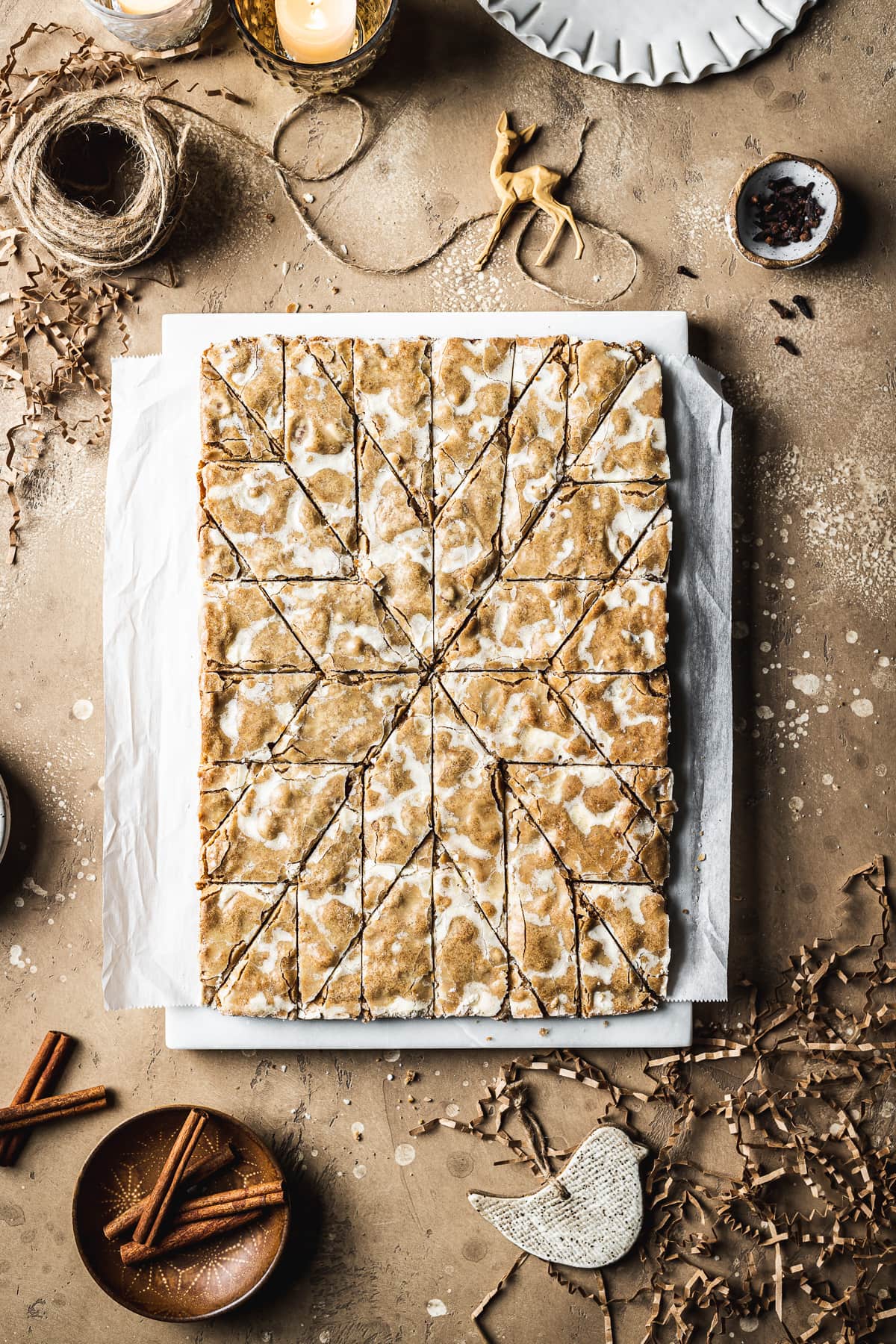 A rectangle of bar cookies cut into a star shape.