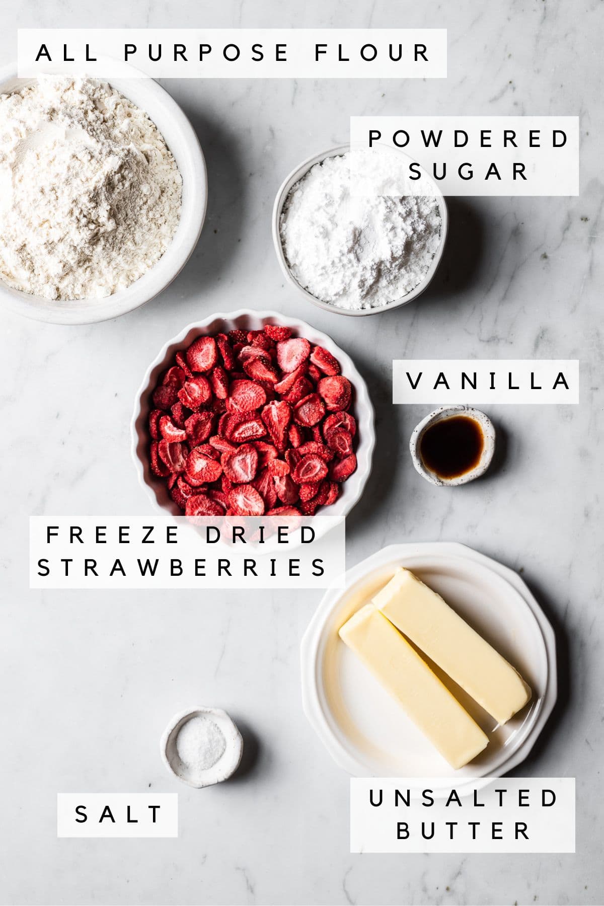 Ingredients in bowls for strawberry shortbread cookies.