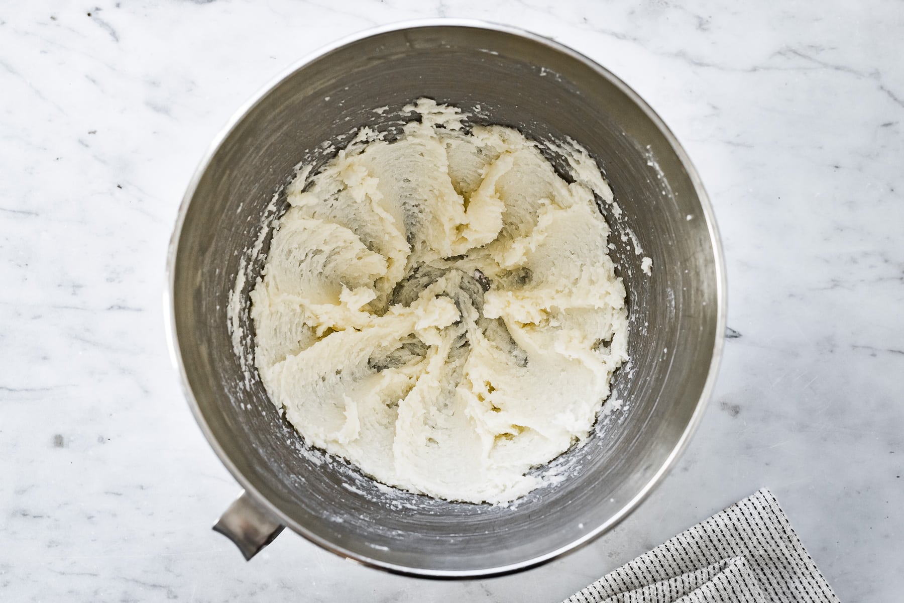 Creamed butter and sugar in a mixing bowl.