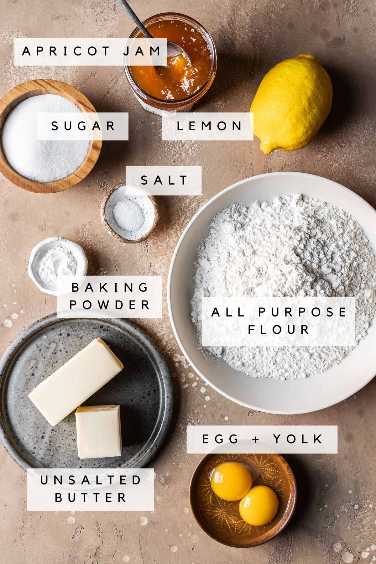 Ingredients for crostata di marmellata with labels.