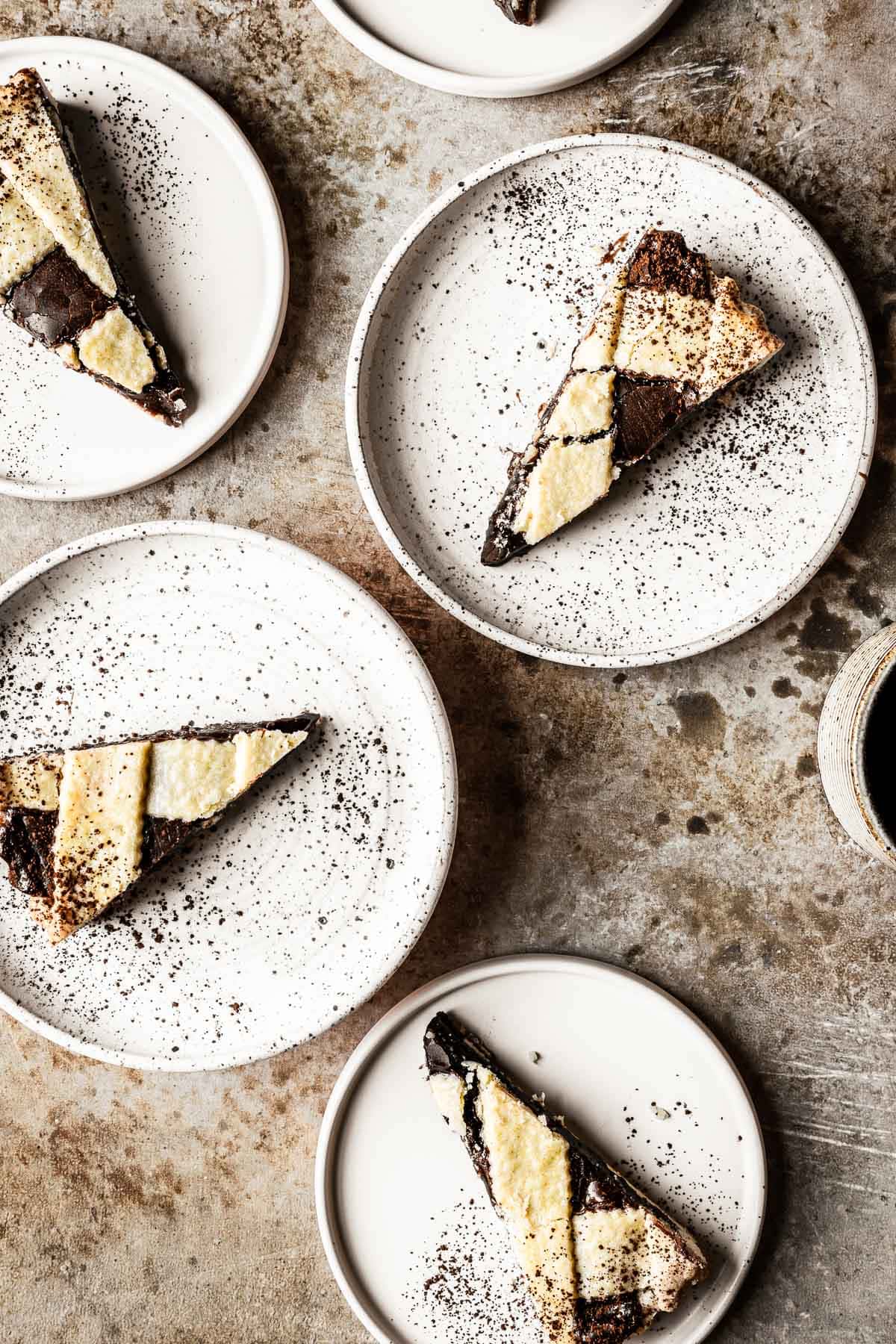 Slices of nutella tart on white plates.