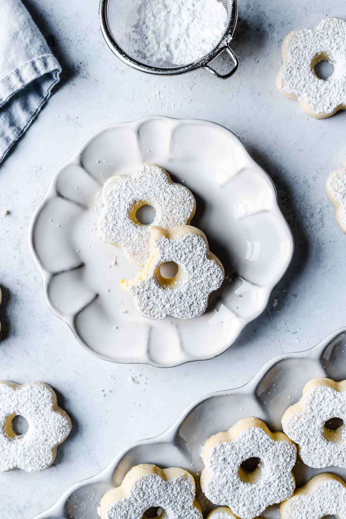 Italian butter cookies on a fluted plate.