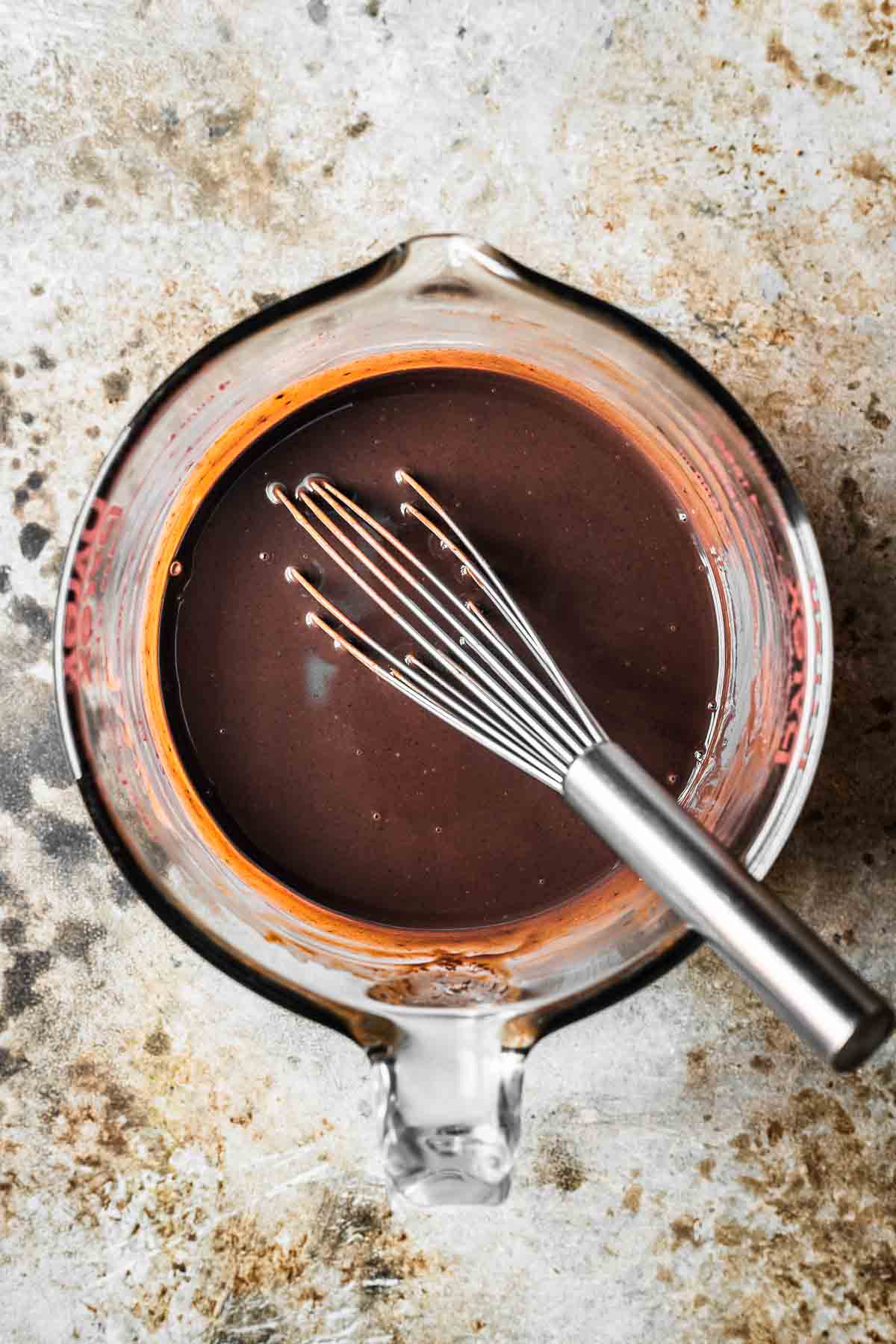 Chocolate ganache glaze for a gingerbread cake.