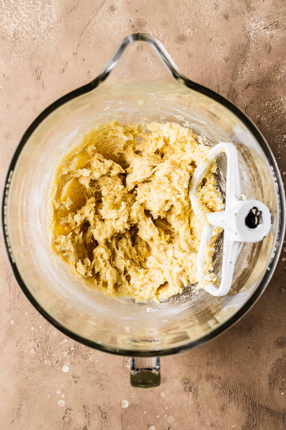 A mixing bowl filled with cookie dough.