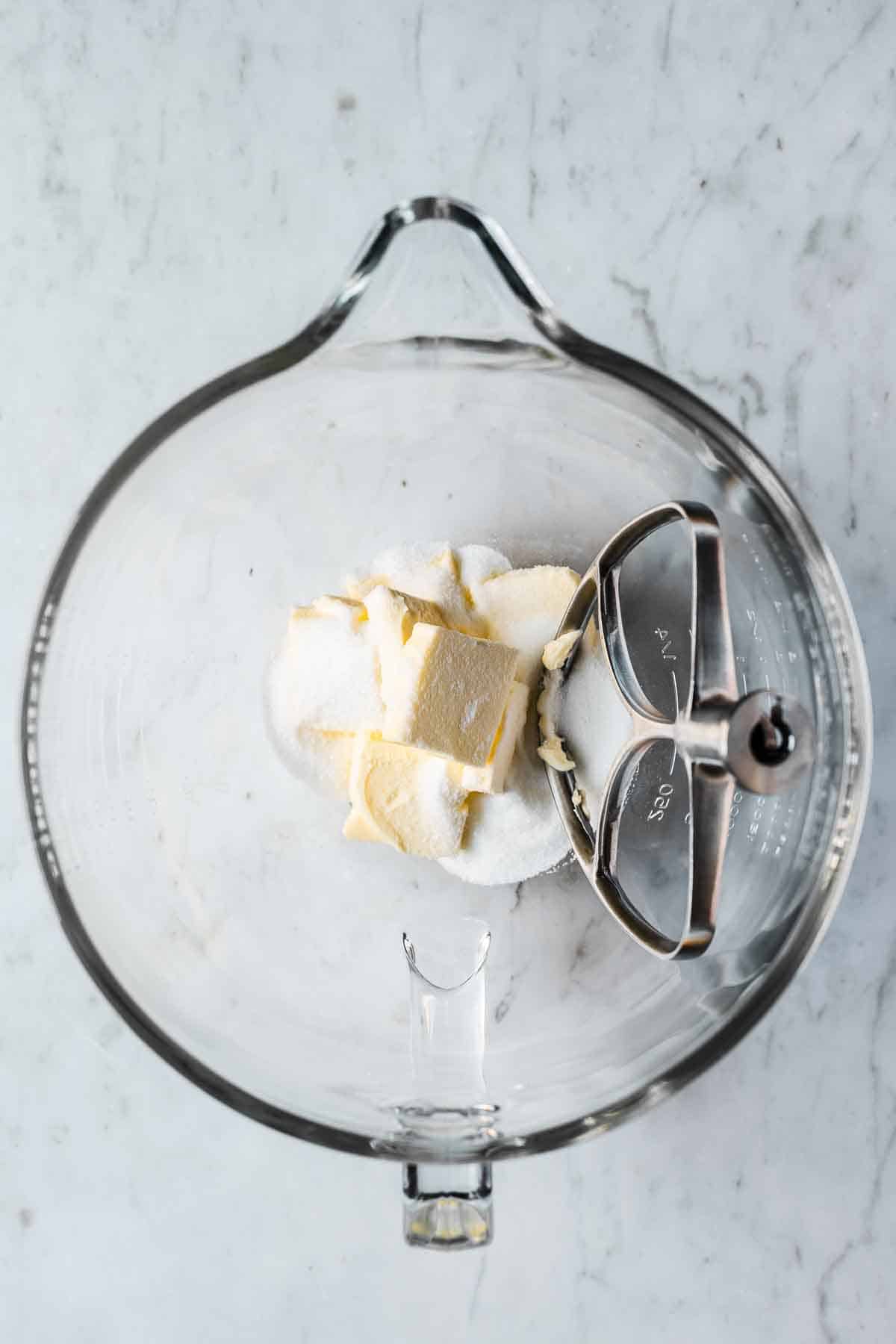 Mixing bowl with butter and sugar added.
