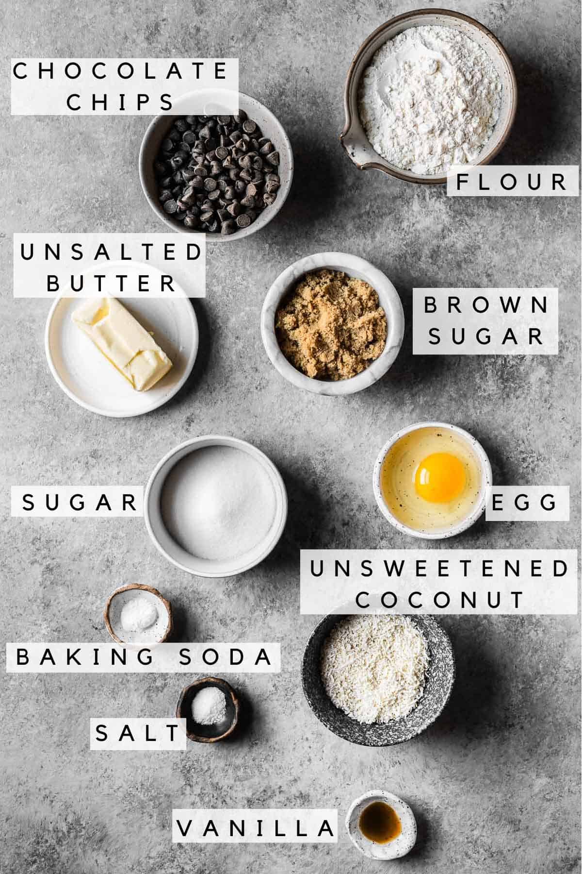 Ingredients in bowls for coconut chocolate chip cookies.