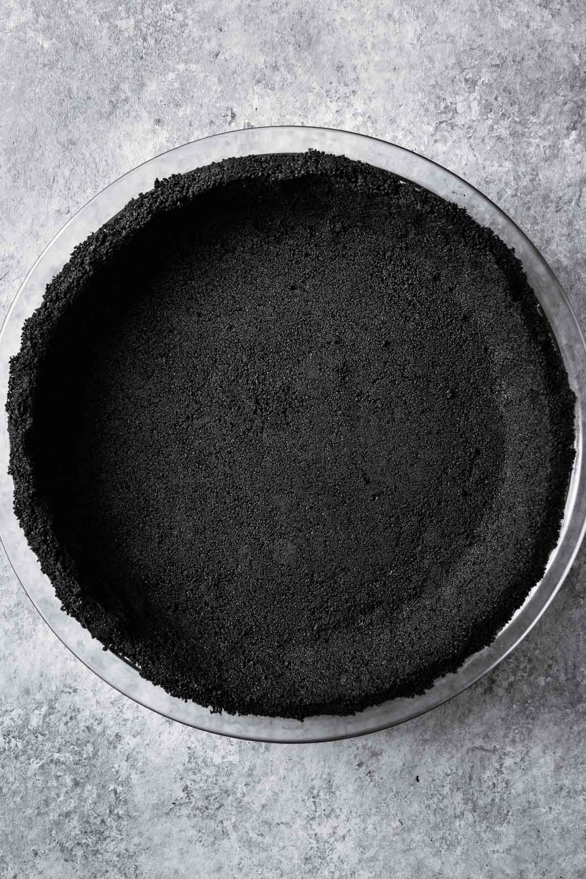 An unbaked crust made of ground wafer cookies and butter.