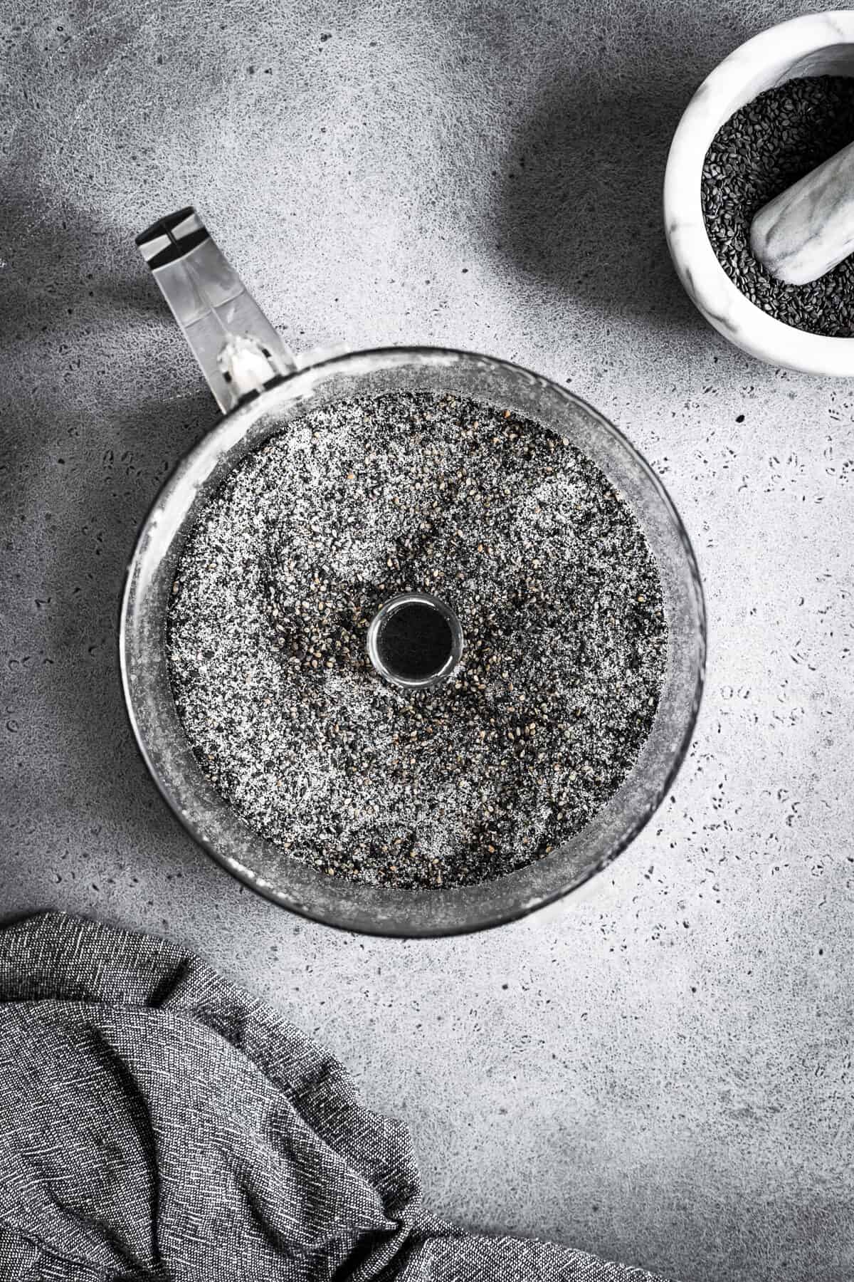 Ground black sesame seeds in a food processor.