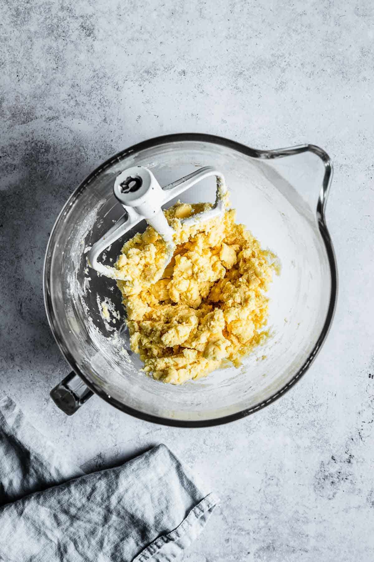 A mixing bowl of finished cookie dough for Argentine alfajores.