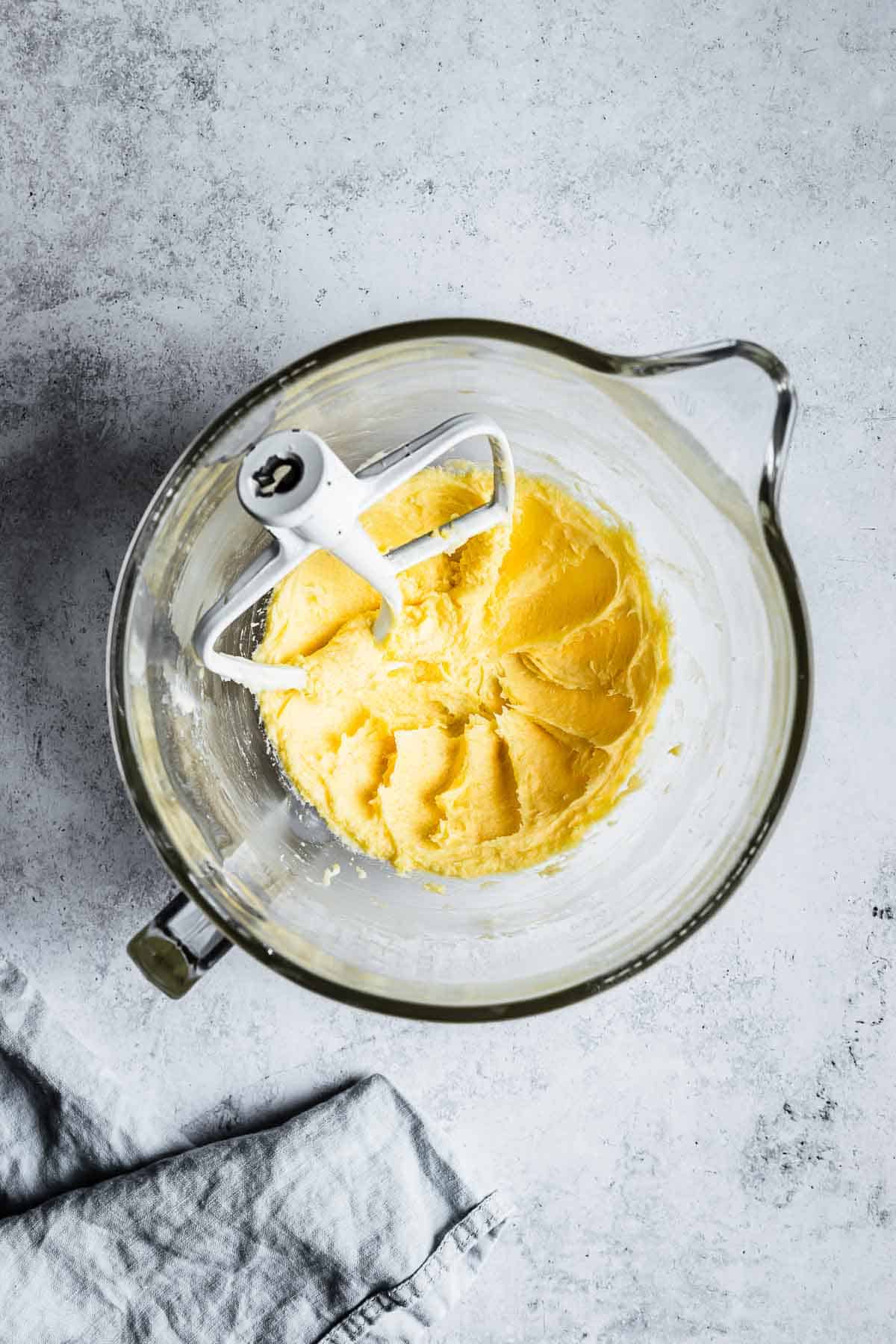 A mixing bowl of wet ingredients creamed together.