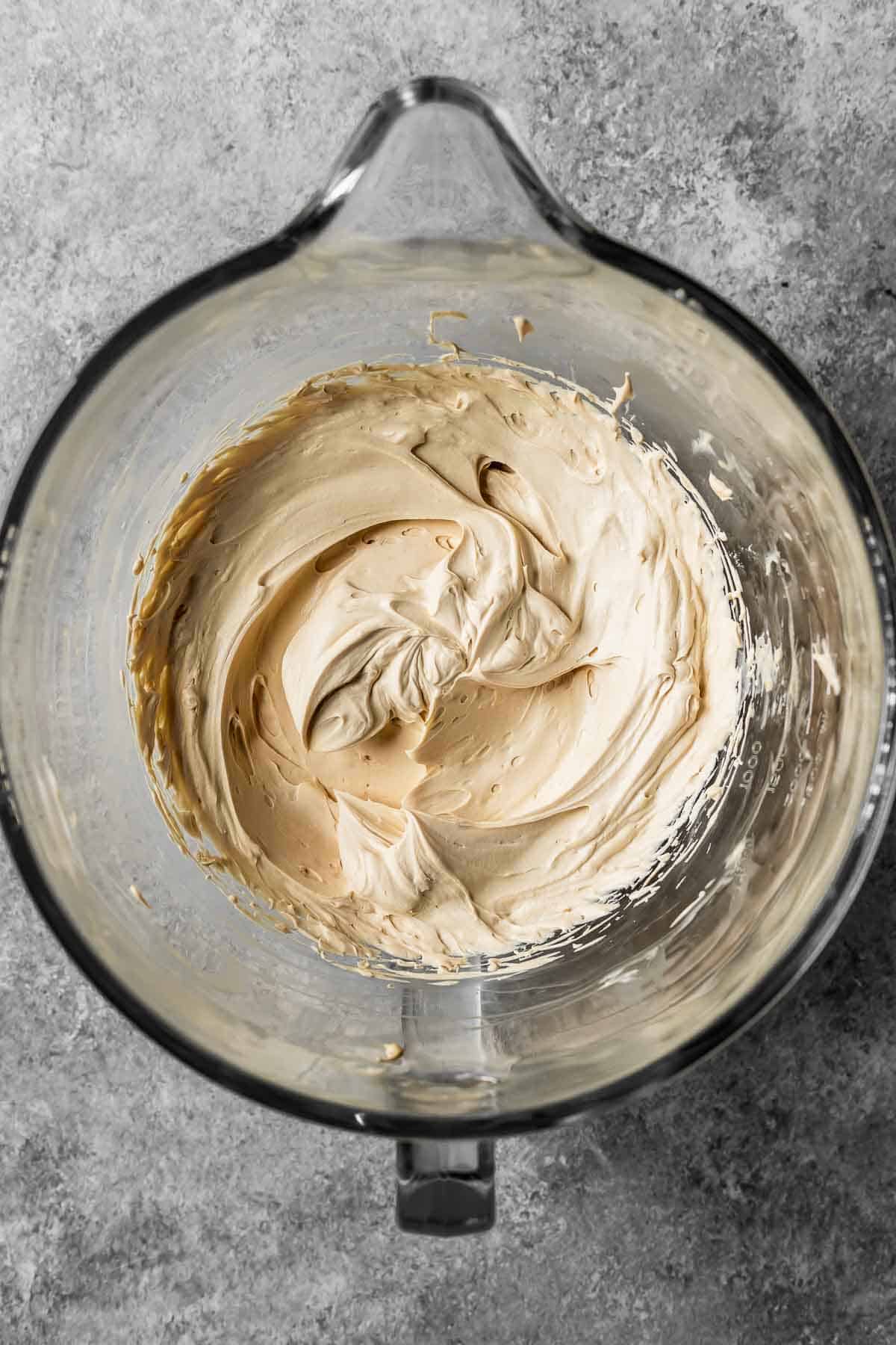 Mascarpone cheese, cream and espresso powder whipped until firm.